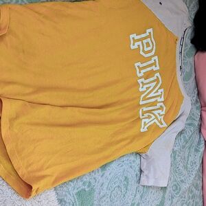 A PINK yellow and white shirt